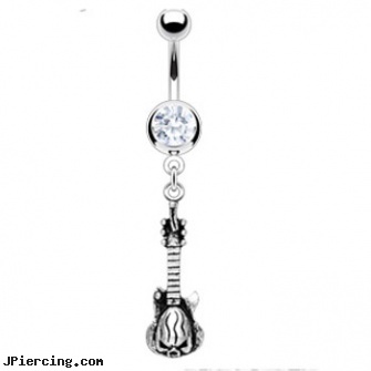 Navel ring with dangling skull guitar, navel piercing and banana bells, egyptian egypt navel rings, giraffe navel jewelry, belly ring care, cock ring wearing instructions